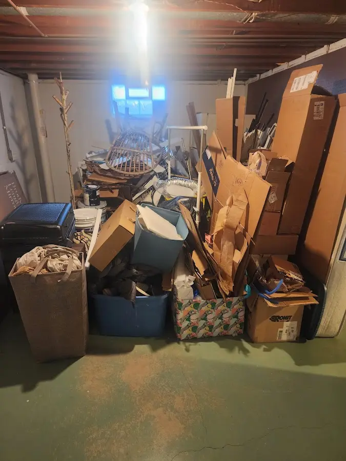 Roll-off dumpster container at job site for Concrete Dumpster Rental in Carrollwood